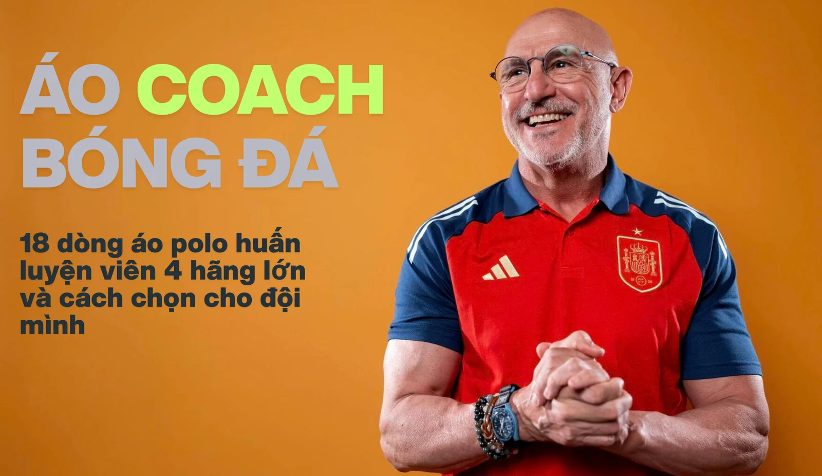 Áo coach bóng đá: HLV Luis de la Fuente mặc áo polo adidas đỏ phối navy của tuyển Tây Ban Nha